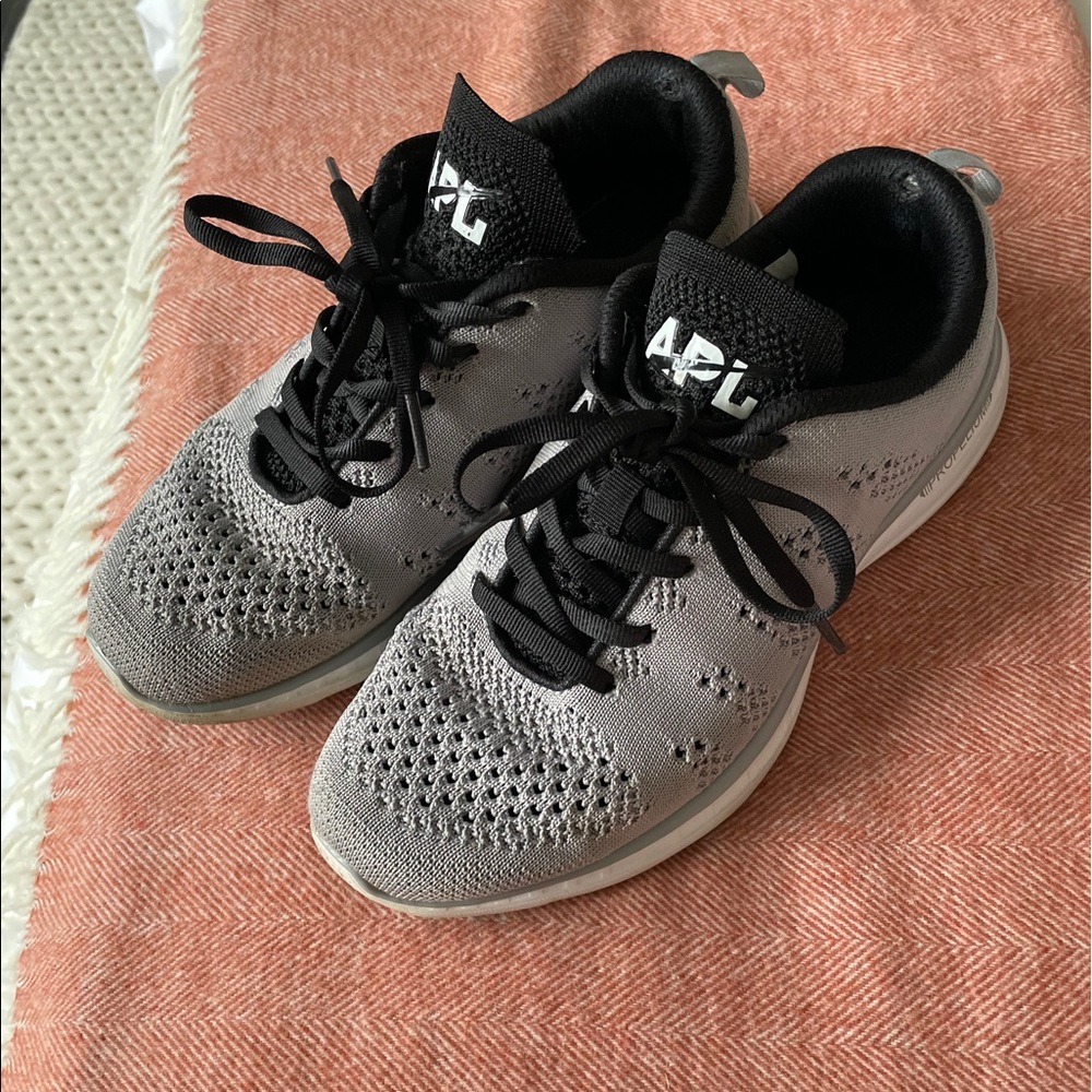 Grey and black APL sneakers